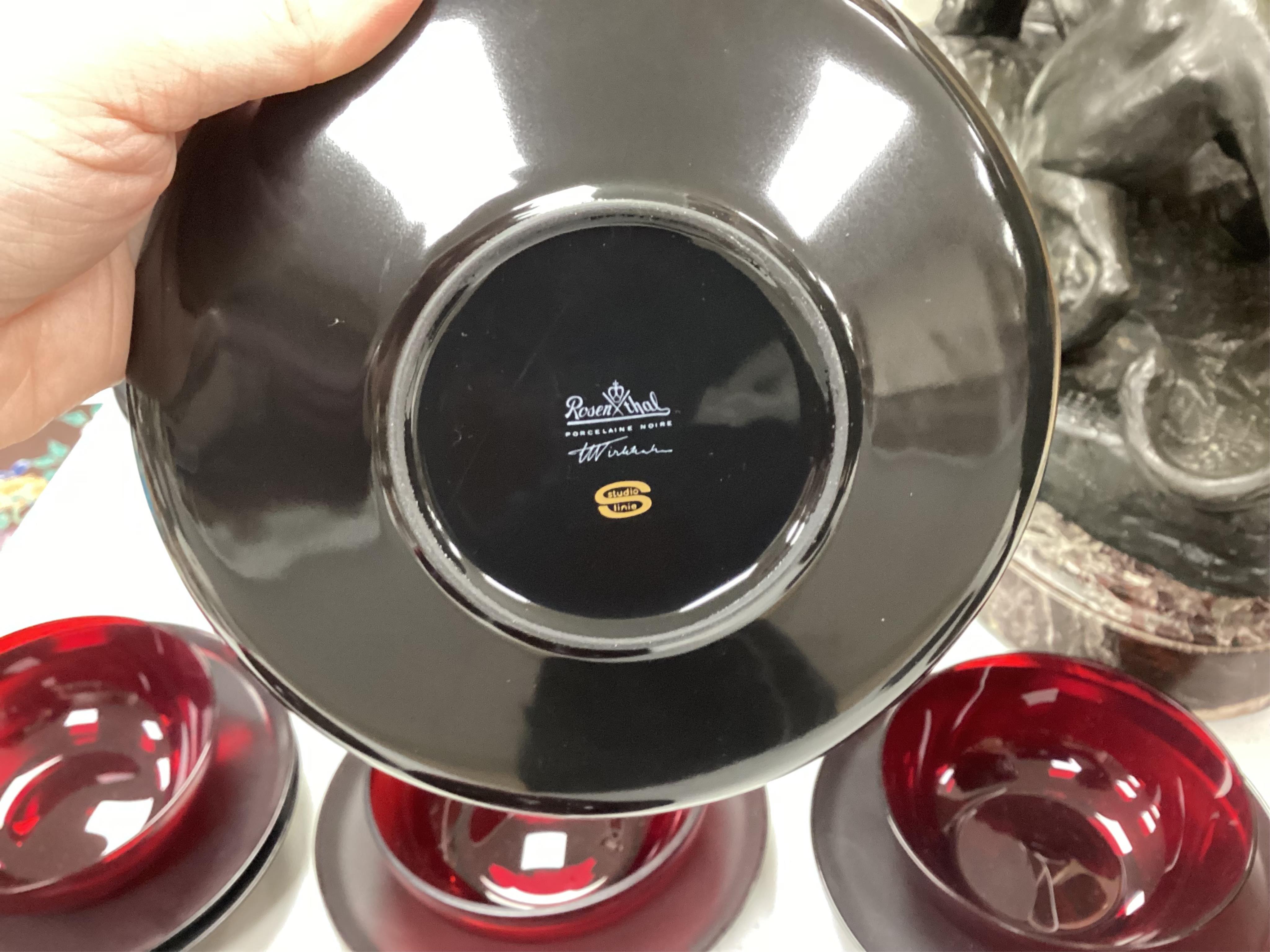 A Wirkkala for Rosenthal part dinner set to include a set of dinner plates, two tureens and six ruby glass bowls, largest 33cm in diameter